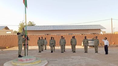 صورة حملة لتعزيز حضور رفع العلم الوطني بمفوضيات الشرطة