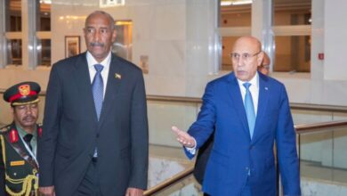 صورة رئيس السودان يغادر نواكشوط