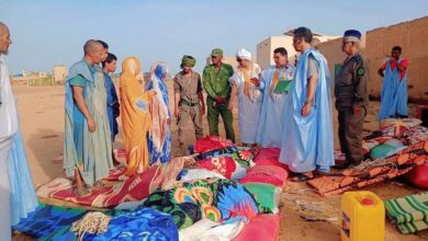 صورة مساعدات حكومية للمتضررين من السيول في قرية تويجكجيت
